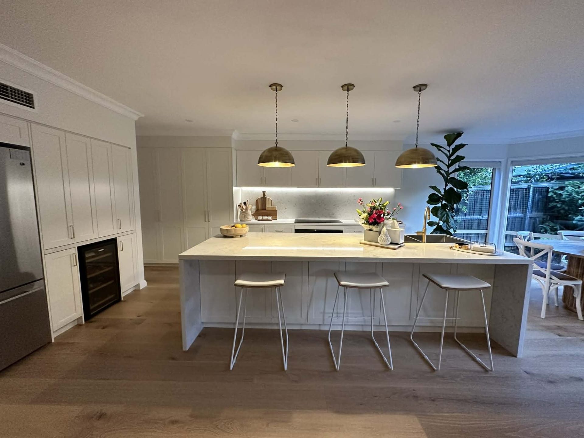 Custom kitchen renovation with stone island bench and pendant lighting by ASP Build & Co, Adelaide